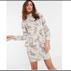 ASOS design peplum mini dress size 6 with jaguar print in cream and black